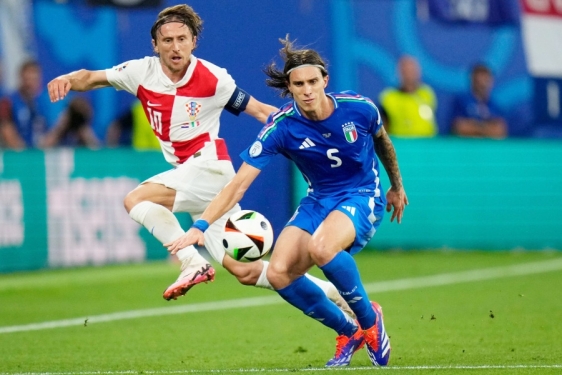 Luka Modrić i  Riccardo Calafiori
