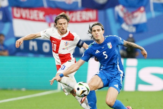 Luka Modrić i  Riccardo Calafiori